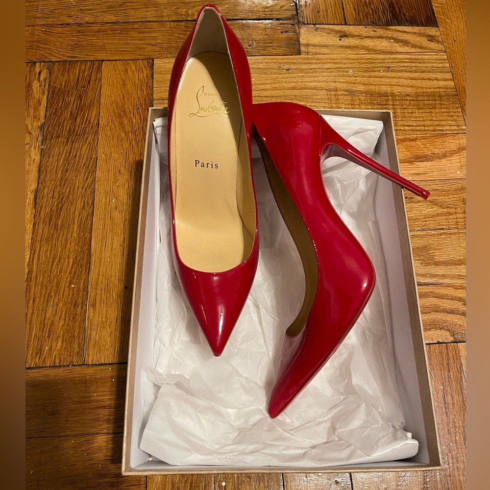 Christian Louboutin
Kate 100 Patent Leather Pumps